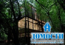 Лесной дом с имитацией листвы 